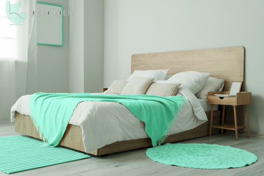 Cama con manta menta