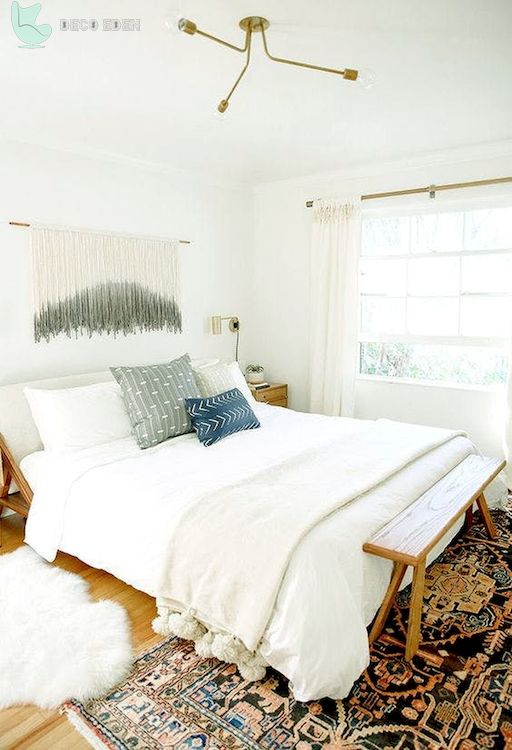 bohemian bedroom with white walls and bedsheets final