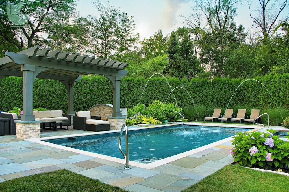 pool with water features and a pergola final