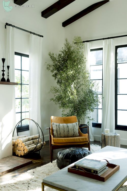 white living room with marble top coffee table and yellow chair final